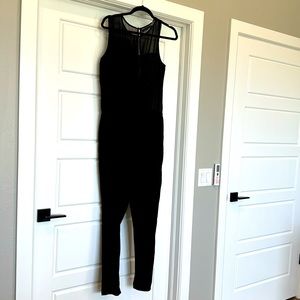 Black jumpsuit..